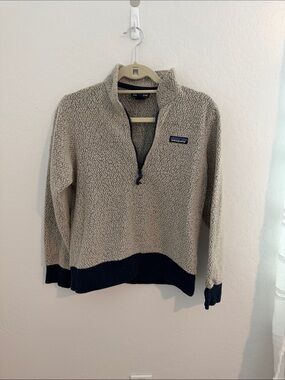 Patagonia Women’s Beige & Navy Sherpa Half-Zip.